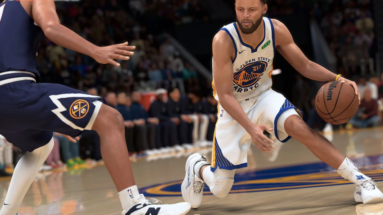 Basketball guard dribbling past a defender in NBA 2K gameplay